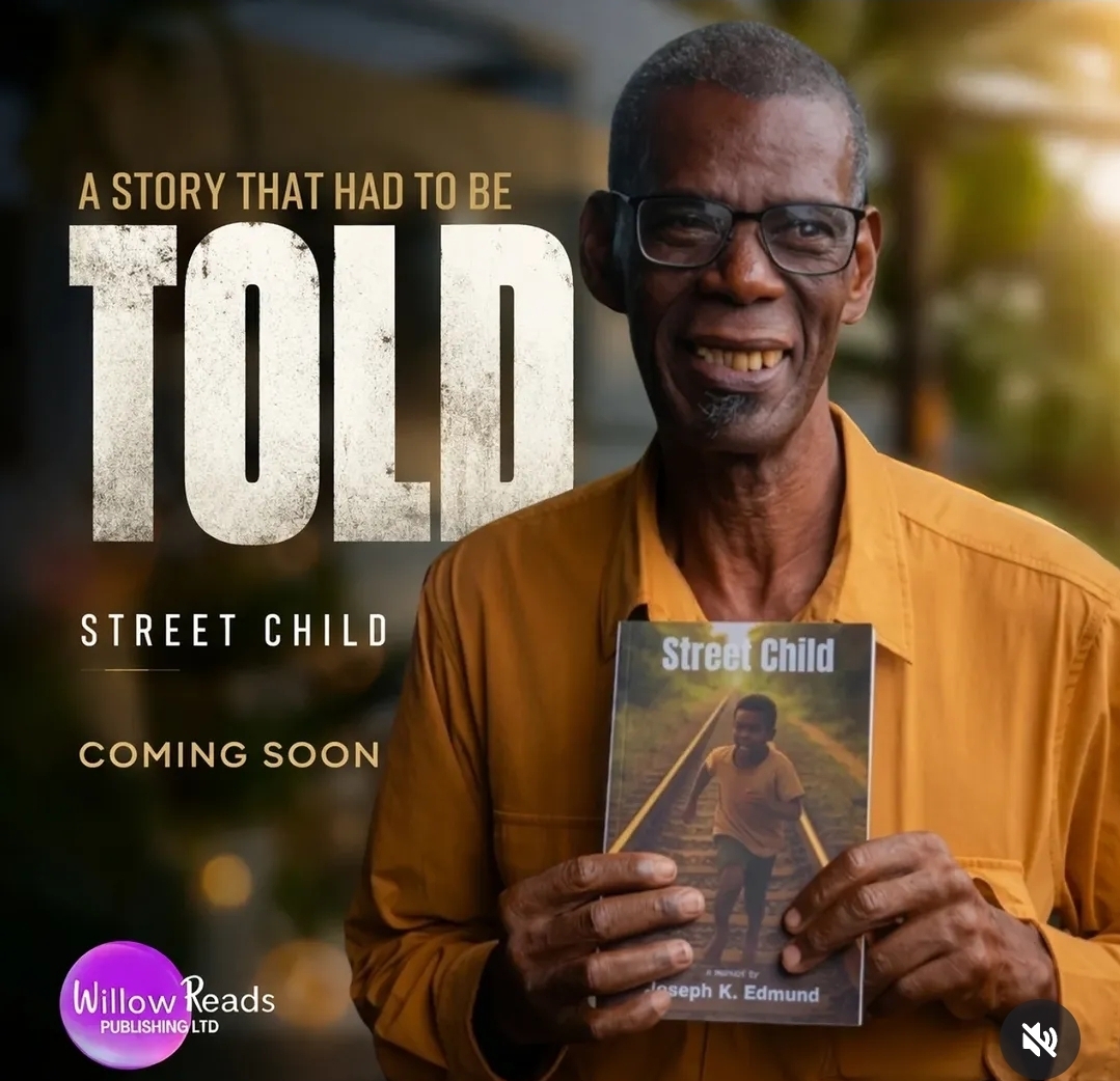 Author Joseph K. Edmund holding his book Street Child in a Willow Reads Publishing campaign